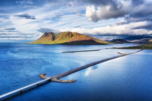Iceland. Aerial view on the mountain and road. Landscape in the Iceland at the day time. Famous place in Iceland. Landscape from drone. Travel - image