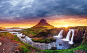 The picturesque sunset over landscapes and waterfalls. Kirkjufell mountain,Iceland