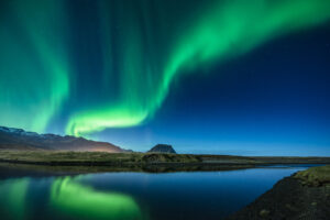 Aurora Borealis above Grundarfjordur, Mt. Kikjufell in centre, Snaefellsnes, Iceland